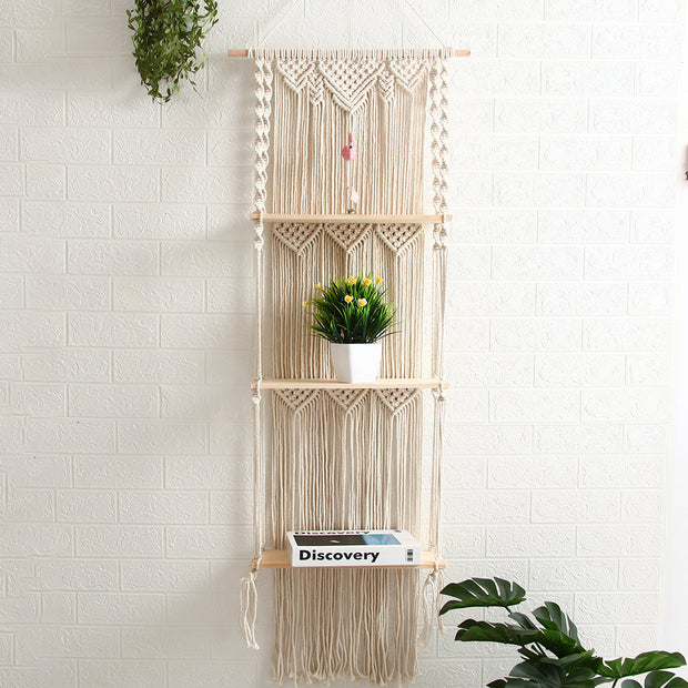 Macrame floating wall shelves with plant and book