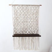 macrame shelf with dark shelf